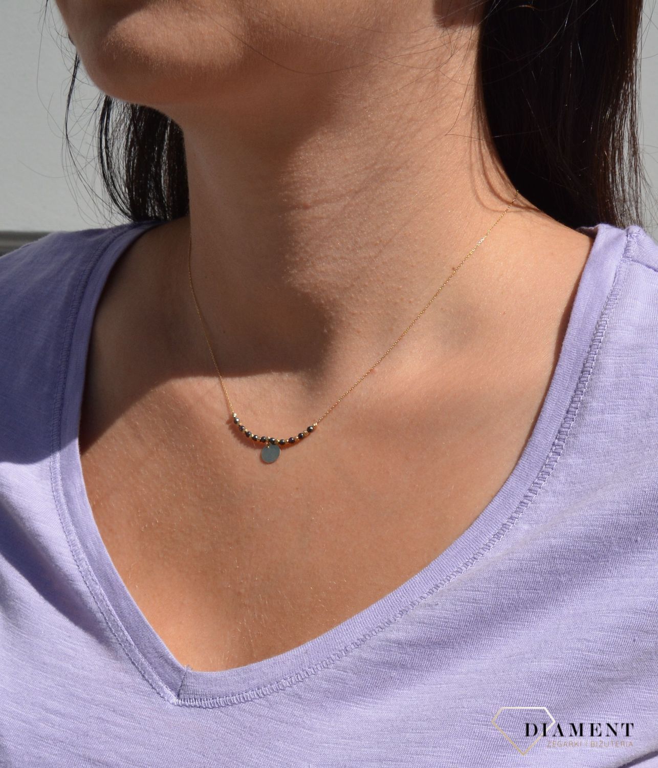 Złoty naszyjnik celebrytka z czarnymi i złotymi kuleczkami NA 2106.jpg